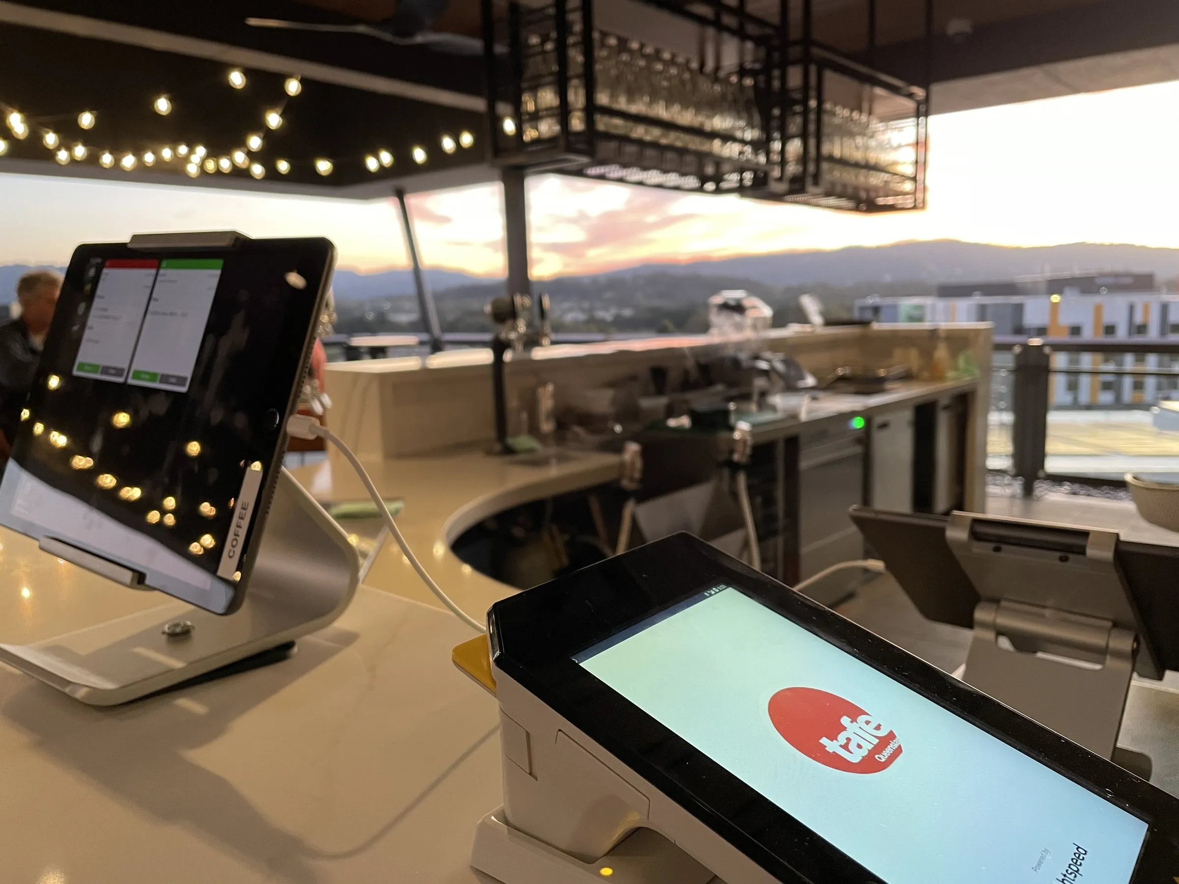 POS tablets set up on a rooftop bar counter